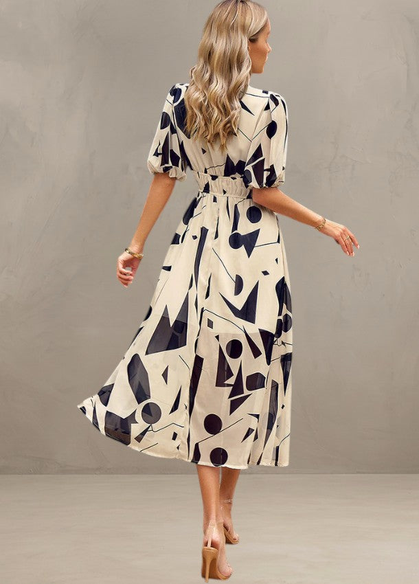 ASTELLA | ABITO MIDI FLOREALE CHE SLANCIA