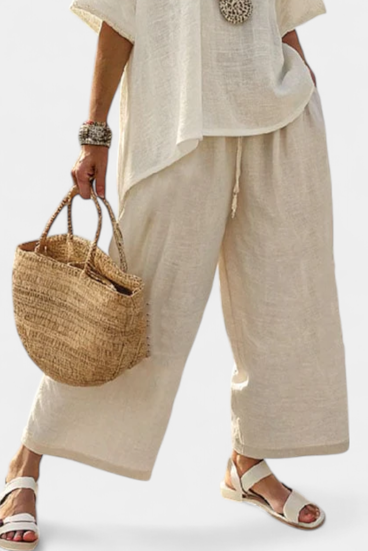 DREVON | BLOUSE RAW MINIMALISTA COMODA & PANTALONI A GAMBALARGA